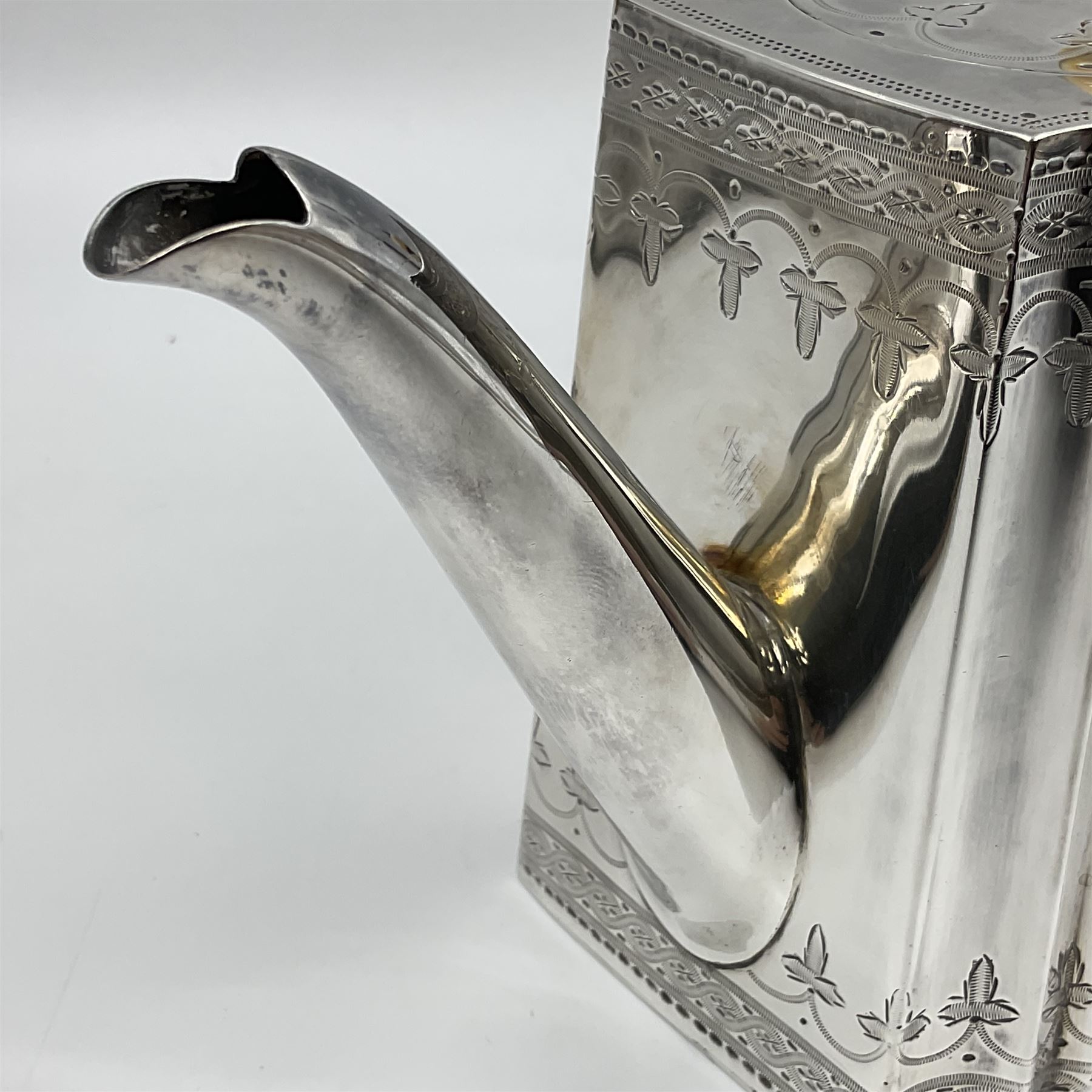 Victorian three-piece silver tea service, comprising teapot, twin handled open sucrier and milk jug, of oval form with shaped rim and C handles, each engraved with crests and bands of strapwork decoration, the milk jug and sucrier with gilt interiors, hallmarked Josiah Williams & Co, Exeter 1881, the teapot with ivory insulators and finial, all contained with a tooled leather, blue silk and velvet lined fitted case, retailed by West & Sun, Dublin 
This item has been registered for sale under Section 10 of the APHA Ivory Act