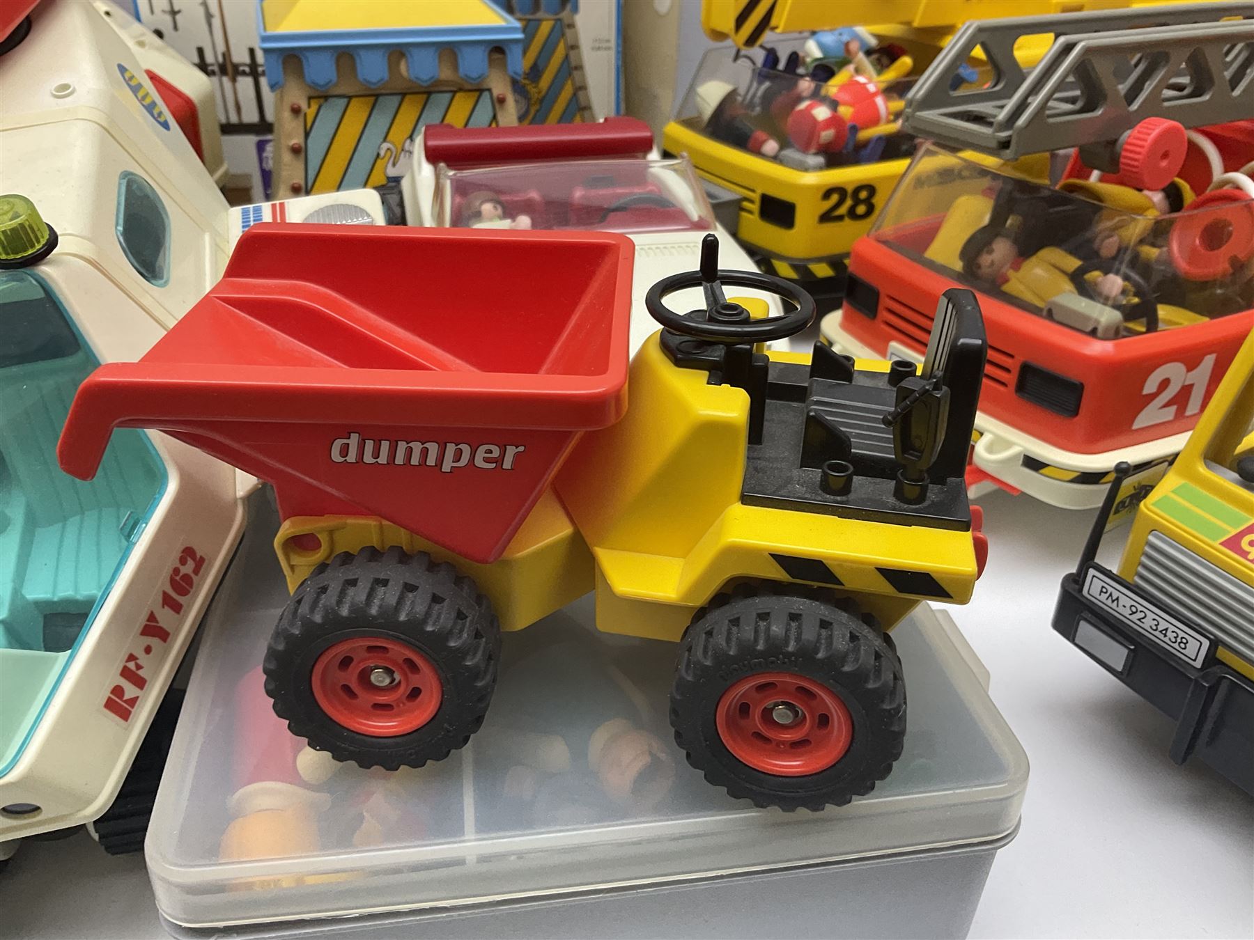 Collection of 1980s/90s Playmobil - vehicles including Fire-Engine No.21, Mobil Crane No.28, Quick Service Truck No.1 with trailer, Dumper Truck, GSL Sports car, GS Turbo car and three motorcycles; together with boxed Knights Tournament Set, Playmospace Space Station and Shuttle, wigwam and various accessories and figures etc