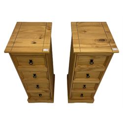 Pair of pine four drawer pedestal chests, black iron handles