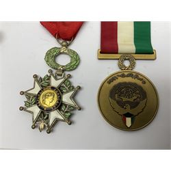 RAOB jewel Bourn Lodge 9394 with 25 years bar; two masonic jewels and triangular pendant watch; British Iron Cross style propaganda medallion; French Legion of Honour and Combatants Cross; and three foreign medals