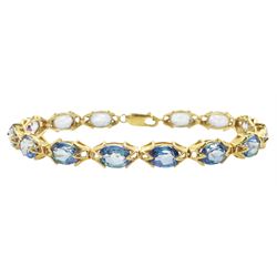 9ct gold oval cut Neptune topaz link bracelet, stamped 375, total topaz weight approx 20.00 carat