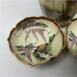 Japanese Satsuma Meiji period vase painted with a mountainous river landscape scene with wisteria and irises; together with a pair of similarly painted small dishes, signature beneath, vase H15cm