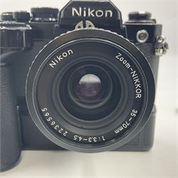 Nikon FM2n camera body, serial no. N8683100, with 'Nikon Zoom-NIKKOR 35-70mm 1:3.3-4.5' len, serial no. 2236565, Nikon MF-16 data back, serial no. 212905 and Nikon MD-12 Motor Drive, serial no 1570382 