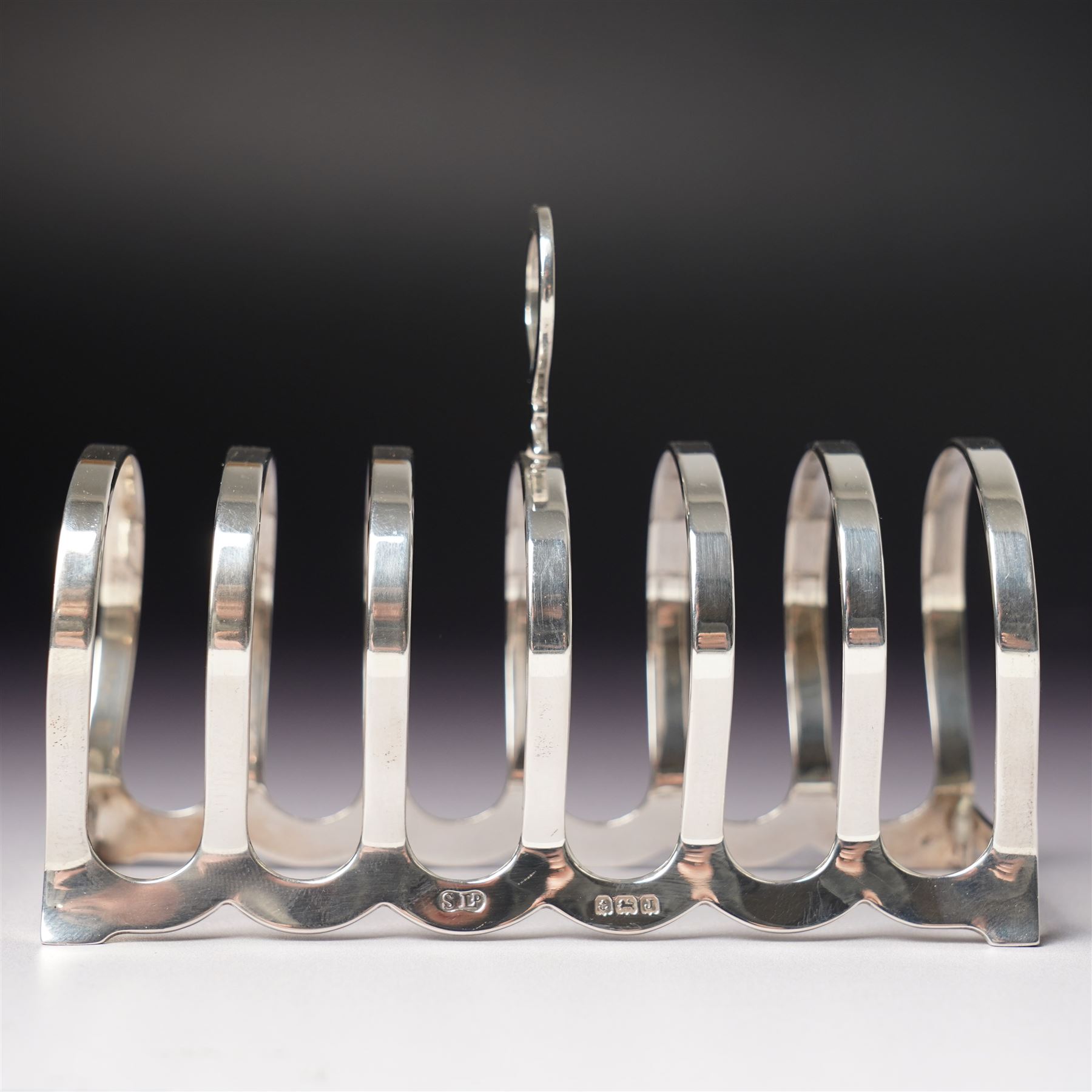 Silver six division toast rack with loop handle Birmingham 1933 Maker William Suckling Ltd