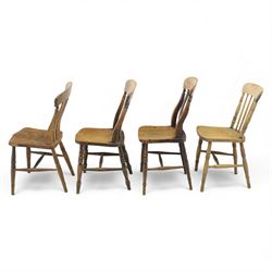 Eight Victorian farmhouse chairs in elm and beech, spindle-back frames with moulded seats, on turned and plain supports