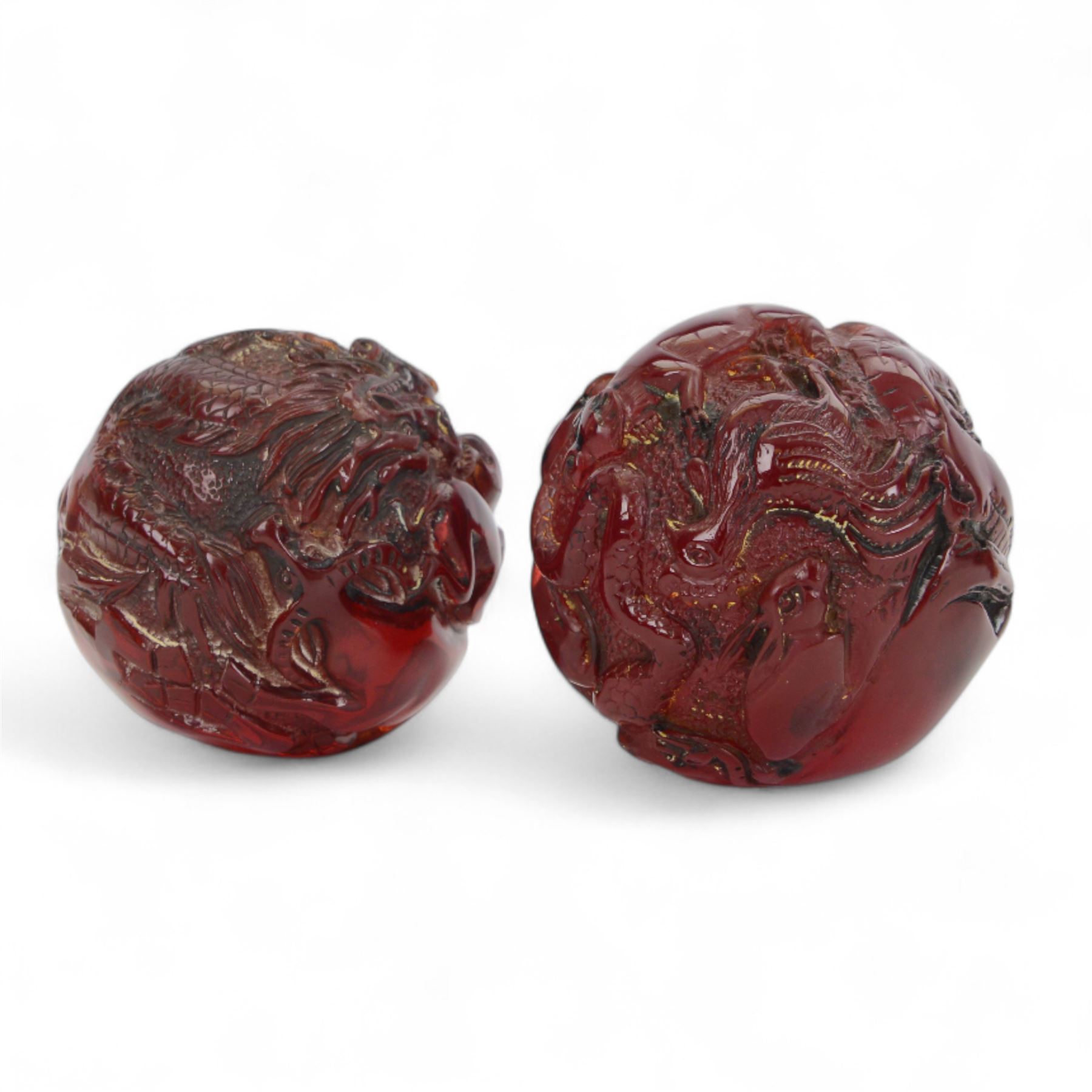 Two clear quartz figures of Buddha, together with five resin figures, including pair of zodiac balls, ram and Buddha, tallest H13cm