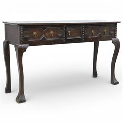 Late 19th century Jacobean revival oak side table, plank top with moulded edge over a cent...