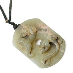 Set of three Chinese carved green hard stone pieces, depicting dragons and clouds, largest W5cm 