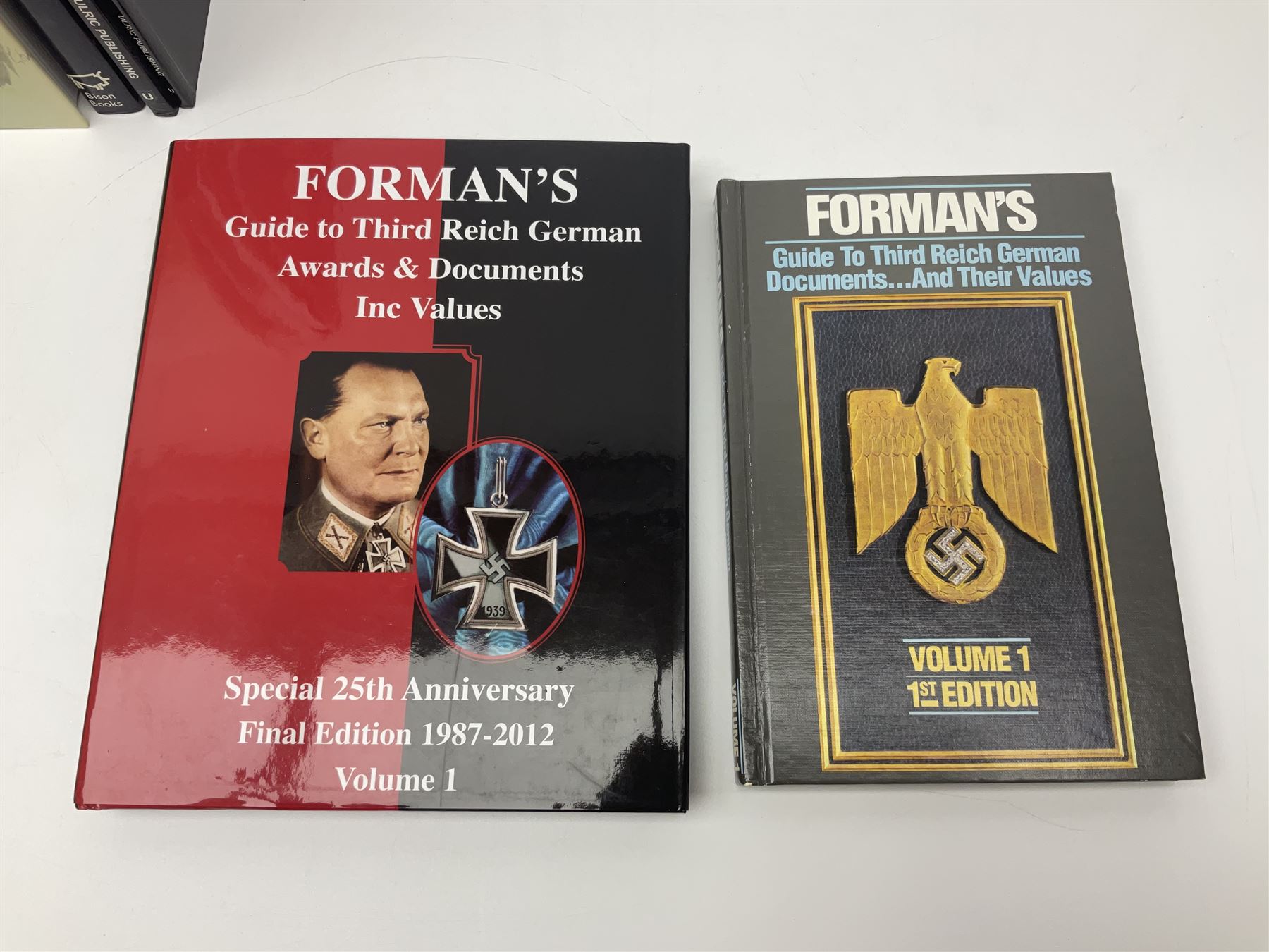 Excellent collection of twelve German Third Reich reference books including four by Adrian Forman - Guide to Third Reich German Awards and Documents, ........ Documents and Their Values. Volumes one and two. Both limited edition and signed by the author; and Bravery, Courage & Valour - Decorations and Awards of the Third Reich; D.E. Bowen: The Prussian & German iron Cross. Signed by the author; Ulric of England: Collecting Third Reich 'SS' and Political Cuffbands. Two volumes; Don Boyle: 'SS' Totenkopf H. Himmler Ring 1933-1945. 2nd printing. Signed by the author and inscribed to 'Adrian' (Forman); and four others (12)