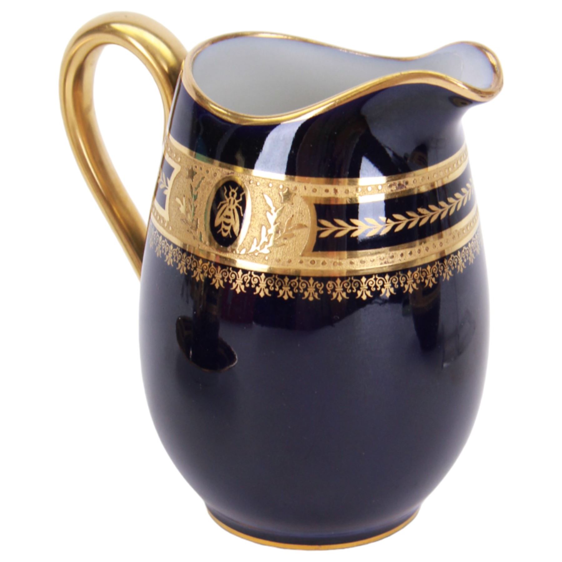 Limoges Coffee can and saucer, jug and open sucrier, all decorated with gilt boarder and decorated with bees framed with laurel leaves, with makers mark beneath