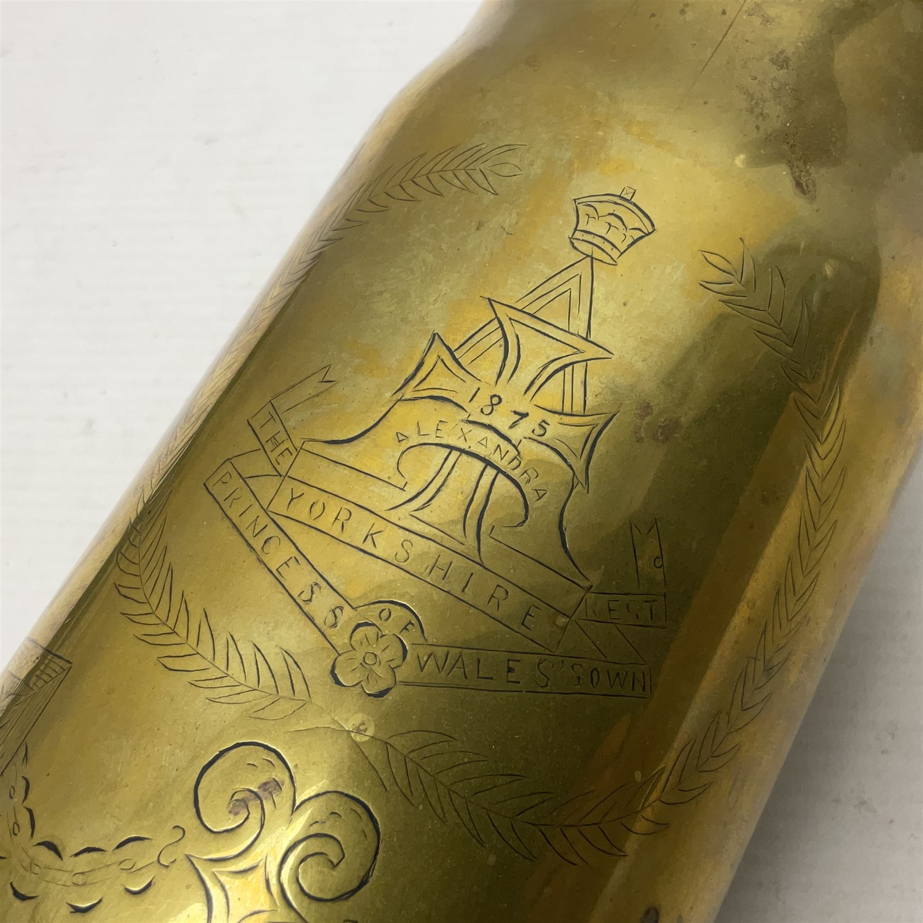 WWI trench art 13-pound anti-aircraft brass shell case engraved Alexandra Princess of Wales, Yorkshire Regiment, bears marks for Royal Ordnance Factory Woolwich 1917 H29cm; WWI British shell fuse dated June 1916; and WWII 20mm brass cannon shell dated 1941 (3)