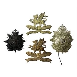 Four Border Regiment cap badges including eleventh battalion (4)