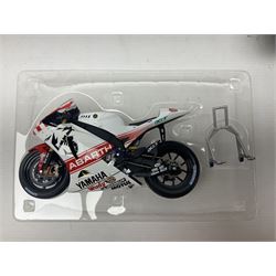 Three Ixo Models 1:12 scale die-cast models of motorcycles - BRB007 Honda NSR500 Michael Doohan 1998; BRB001 Honda RC211V Valentino Rossi 2003; and Yamaha YZR-M1 Colin Edwards MotoGP Phillip Island 2007; all boxed (3)