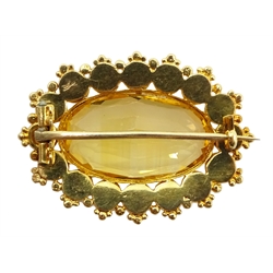  18ct gold oval citrine and split pearl brooch and a pair of gold, paste horseshoe earrings stamped 9ct  