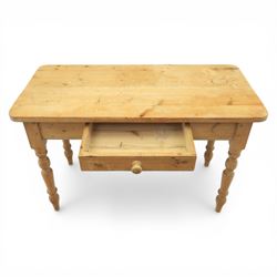 Victorian design stripped pine table, rectangular top with rounded corners, single centre drawer, raised on four turned legs