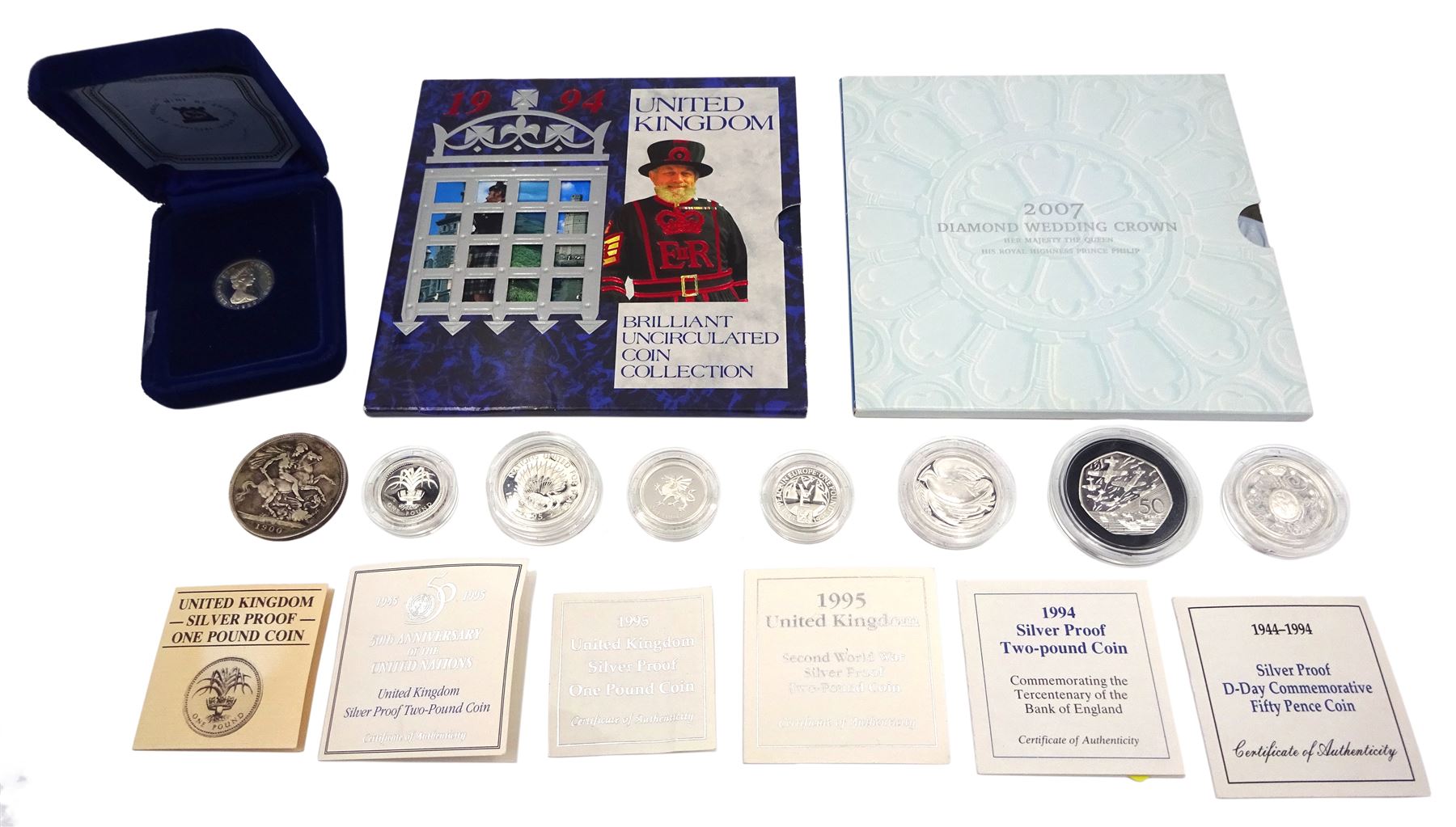 Mixed coins, including 1994 United Kingdom Brilliant Uncirculated coin collection, 2007 diamond wedding crown, various silver proof coins, Queen Victoria 1900 crown etc