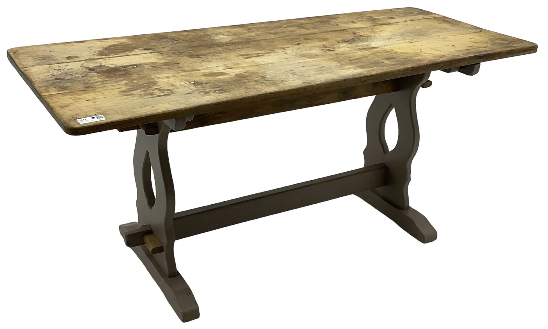 20th century oak refectory dining table, rectangular stripped top on painted base, shaped end supports on sledge feet united by two pegged stretchers