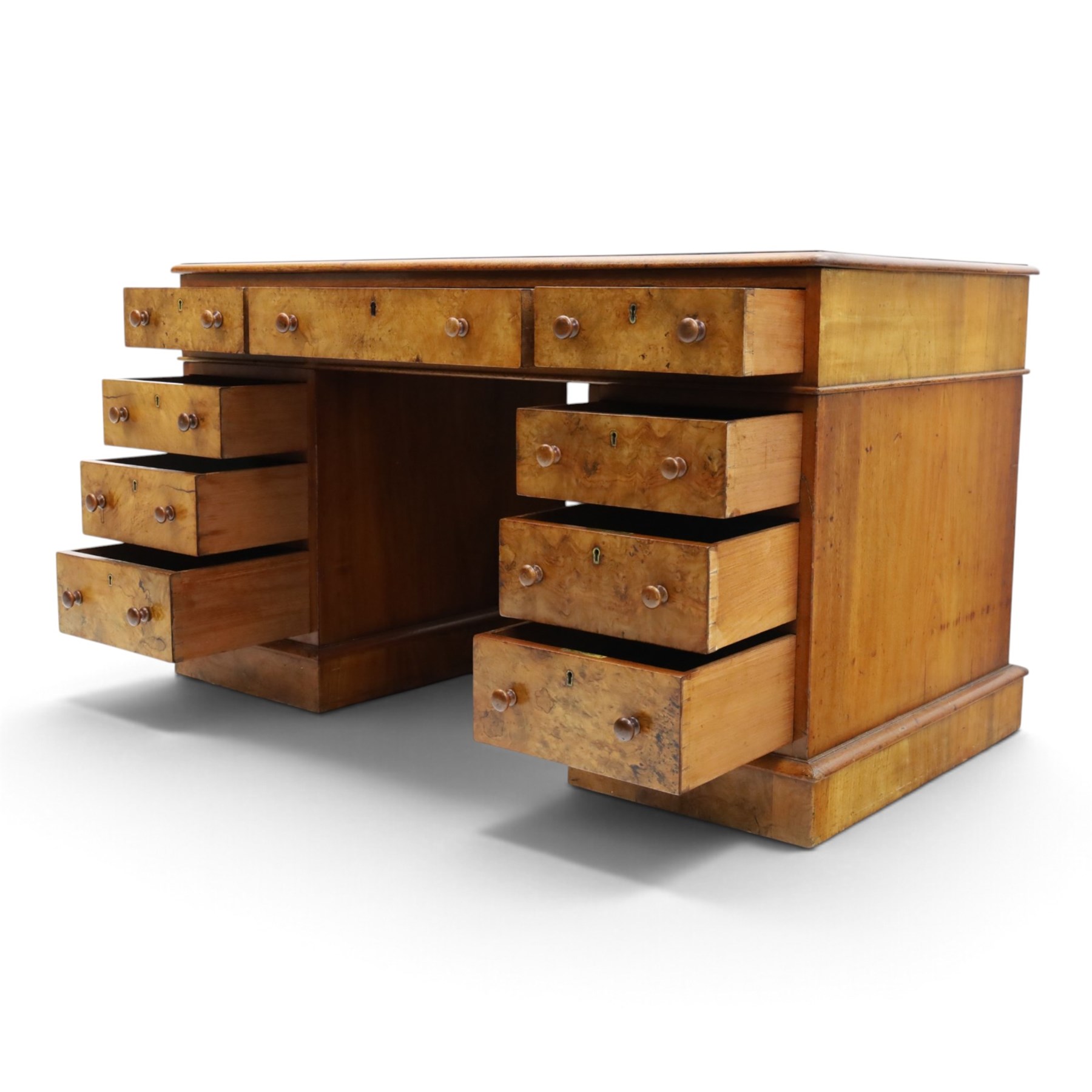 19th century burr walnut twin pedestal desk, rectangular top inset tooled green leather insert with moulded edge, frieze with three drawers with turned wooden pulls, raised on pedestal bases, containing three graduated drawers raised on plinth bases with castors