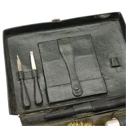 Set of six dessert knives and forks with silver collars and mother of pearl handles, silver plated photograph frame and travelling toilet set in leather case