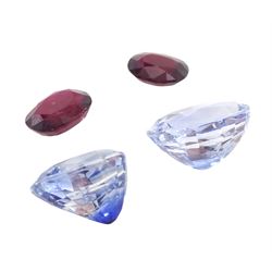 Two loose sapphires and two loose rubies, each ruby 0.58 carat and 0.82 carat