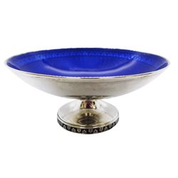 Small early 20th century Norwegian silver and enamel pedestal bowl, the bowl of circular form with blue guilloche enamel interior upon a circular spreading foot with stylised black enamel border, marked beneath for David Andersen, and stamped 925, D8.5cm H4cm, approximate gross weight 2.50 ozt (77.8 grams)
