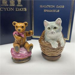 Four Halcyon Days bonbonnieres, modelled as a cat in a basket, a cheetah on rocky ground and two teddy bears, all boxed 