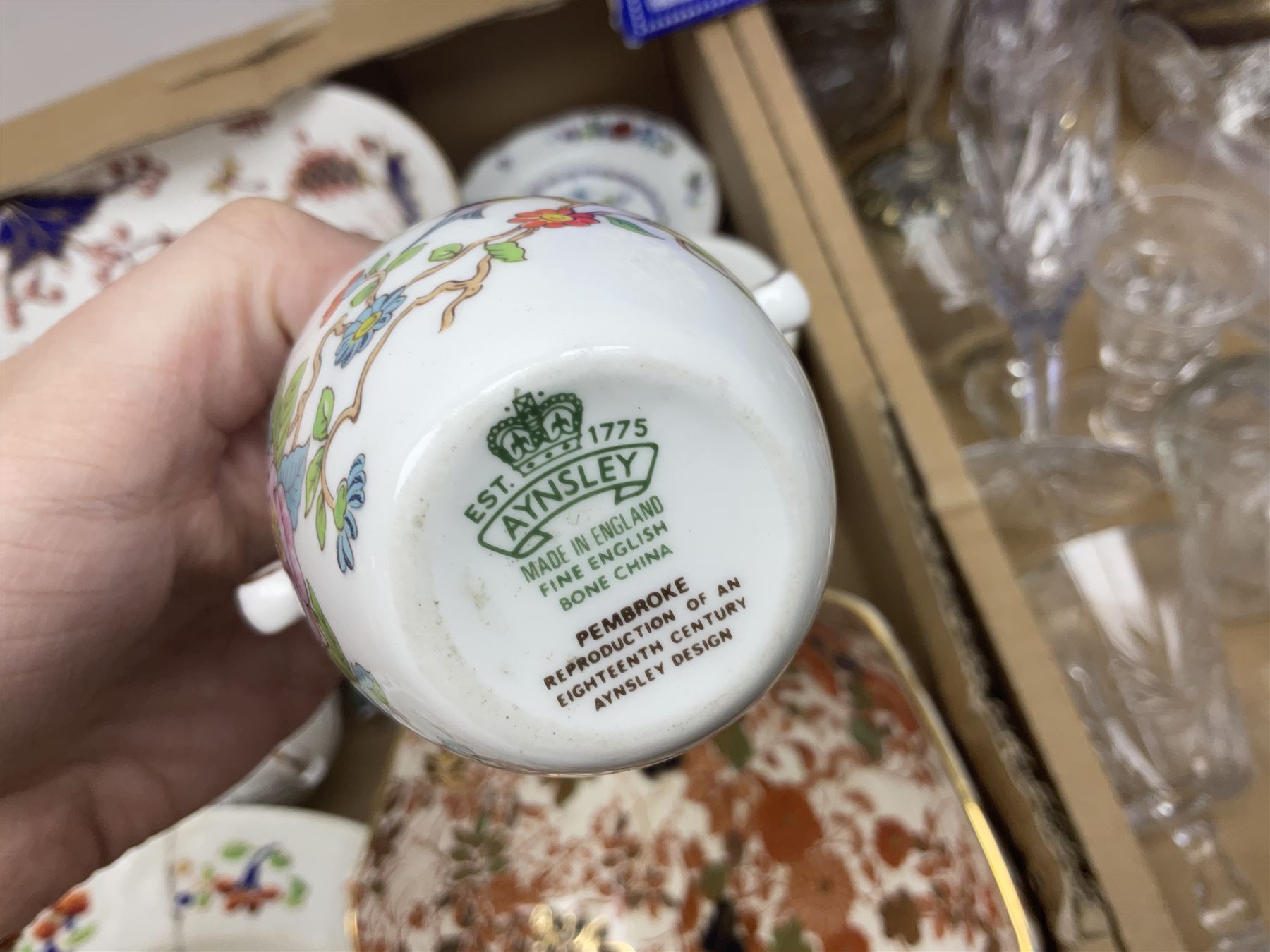 Large Coalport bowl in Hong Kong pattern, together with Coalport mask-head jug, Baccarat glass vase, and other glassware and ceramics, in three boxes 