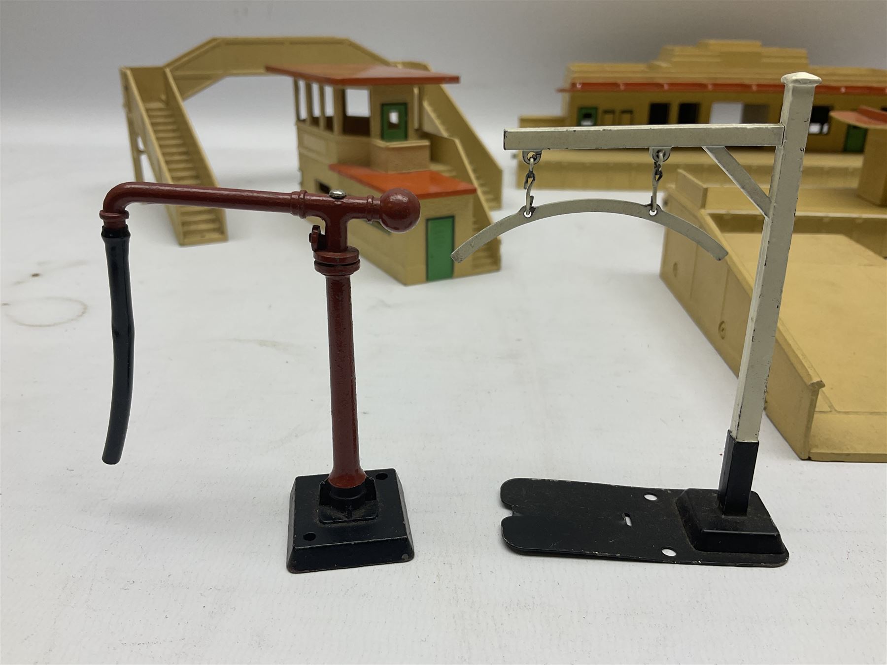 Hornby Dublo - two stations, signal box, 3-piece platform, footbridge, girder bridge etc; and other die-cast trackside and station accessories; all unboxed