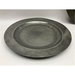 Group of seven 19th century pewter chargers, each of circular form with dished centre, two examples with touch marks verso, each approximately D39cm