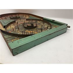 1934 Lindstrom's 'Airways' tin-plate bagatelle game by Lindstrom Tool and Toy Company Bridgeport Conn., the decorative bagatelle board depicting Lindstrom's epic airway routes; with wooden peg and quantity of balls H61cm