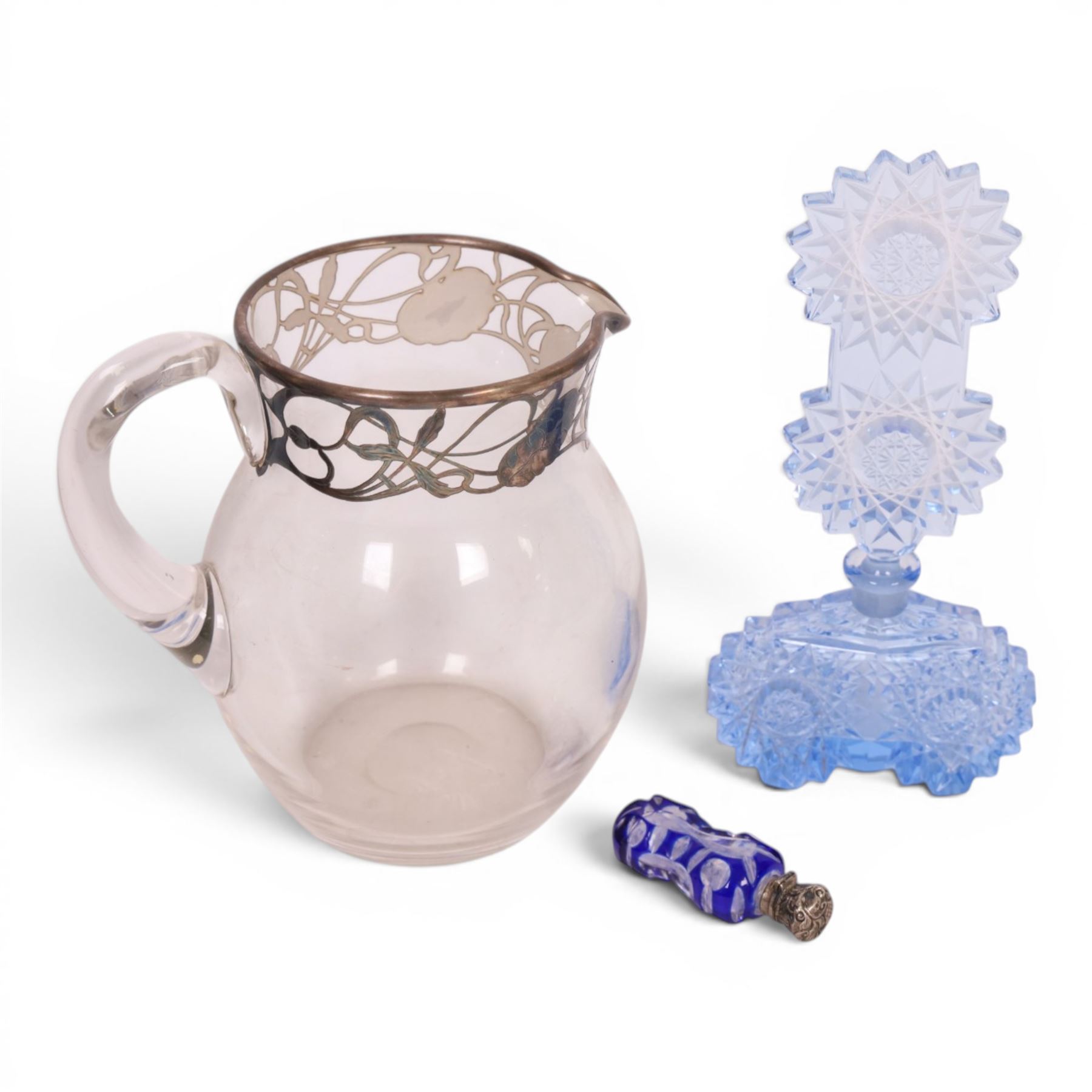 Victorian silver topped and blue overlaid cut glass scent bottle, together with Czechoslovakia blue glass scent bottle and glass jug with silver decoration