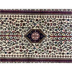 Persian Abadeh indigo ground runner rug, ivory field with pole medallion surrounded by plant and bird motifs and contrasting spandrels, border with interlaced flowerheads