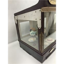 Early 20th century scratch-built wooden hat & gown shop diorama 'Joan', of double-fronted form glazed on three sides with brass and aluminium mounts, rear access apertures and storage under L63cm H45cm D31cm; with small collection of dresses and hats on display stands