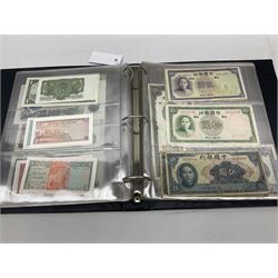 World banknotes, including Queen Elizabeth II The States of Jersey one pound 'DB202703', five pounds 'BB527762' and ten pounds 'AB651481', reserve bank of New Zealand two dollars '1L3 741894', King George V Straits Settlements one dollar 1st January 1935 'F/83 28924', various Bank of England notes etc, housed in two ring binder albums