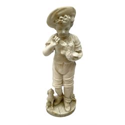 Marble figure of a boy donning a hat stood feeding a pigeon in his left arm with a hound seated by his feet, upon circular base, H41cm