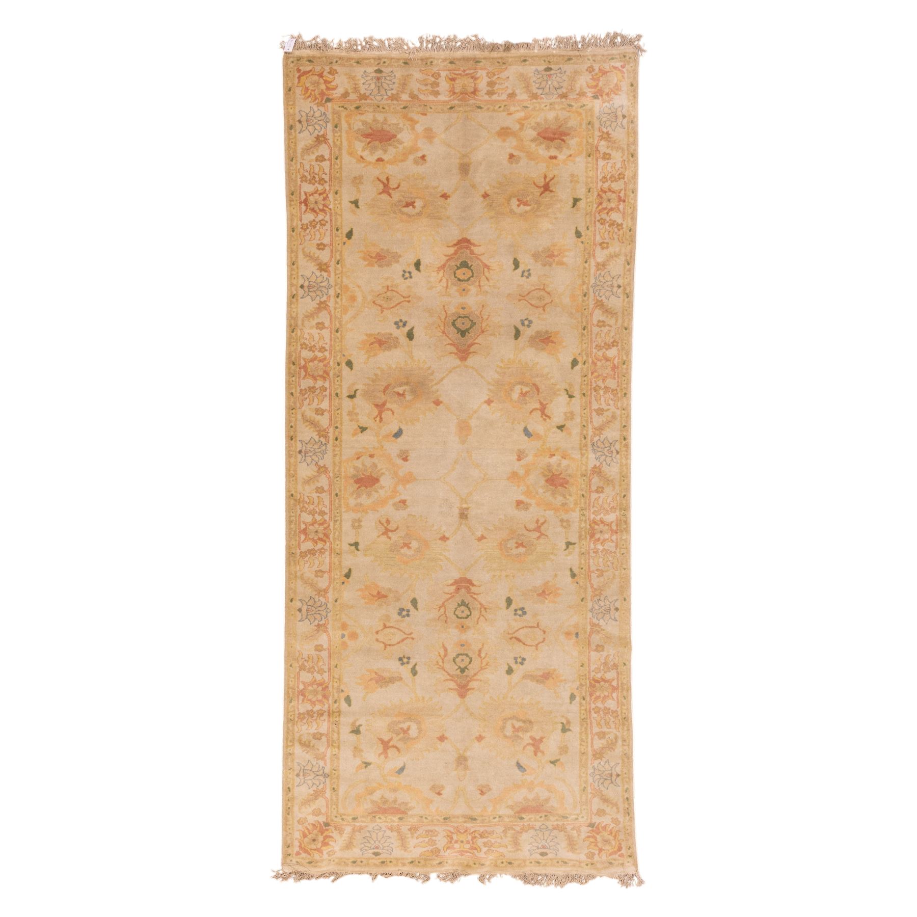 West Persian hand-knotted Ziegler design rug, ivory field decorated with an all-over lattice of stylized palmettes and floral sprays linked by angular vines, border of scrolling floral ornamentation in a palette of blush pink, sage green, powder blue, and soft ochre, with cotton fringe ends 