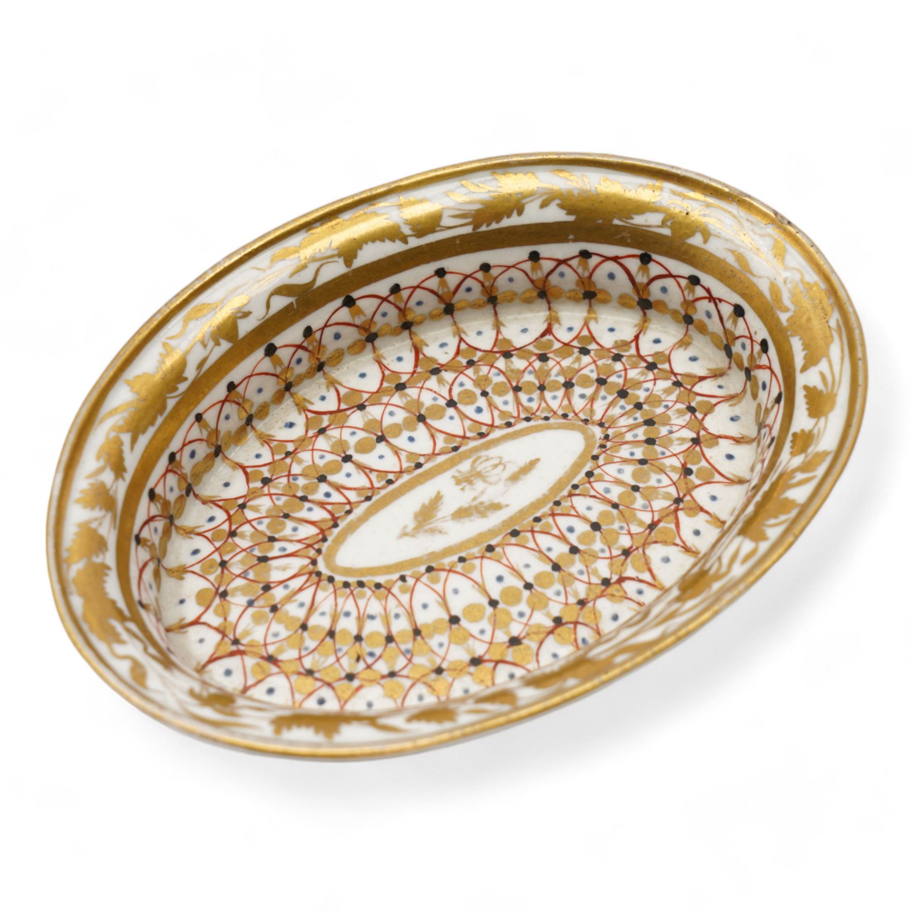 Early 19th century English porcelain miniature rosewater sprinkler in the form of a coffee pot, floral encrusted and painted body with flower knop handle and scroll handle, pattern no. 7916, H16.5cm, 19th century Rockingham style seated model of a Lion, L9.5cm and an early 19th century oval dish, inscribed beneath Geo. Maddey, 1803 (3)