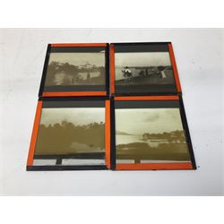 Large collection of over three hundred glass magic lantern slides including country, beach, town and street scenes, some with figures and animals