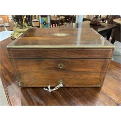  Victorian brass inlaid rosewood dressing table box, retailed by F.L. Hausburg, Liverpool, the lid centred by a brass cartouche, opening to reveal letter store to lid underside, above a fitted interior, with ten mounted cut glass jars, bottles and manicure set, within lift out leather trays, above jewellery drawer, with key, H17cm D24cm