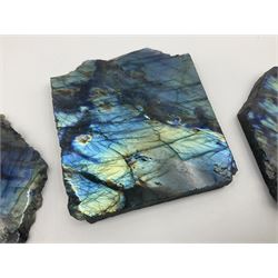 Five slabs of polished labradorite with raw edges, largest H9cm, L10cm