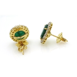  Pair of oval cut emerald and diamond gold cluster stud ear-rings, hallmarked 18ct, emeralds approx 6 carat, diamonds approx 2 carat  