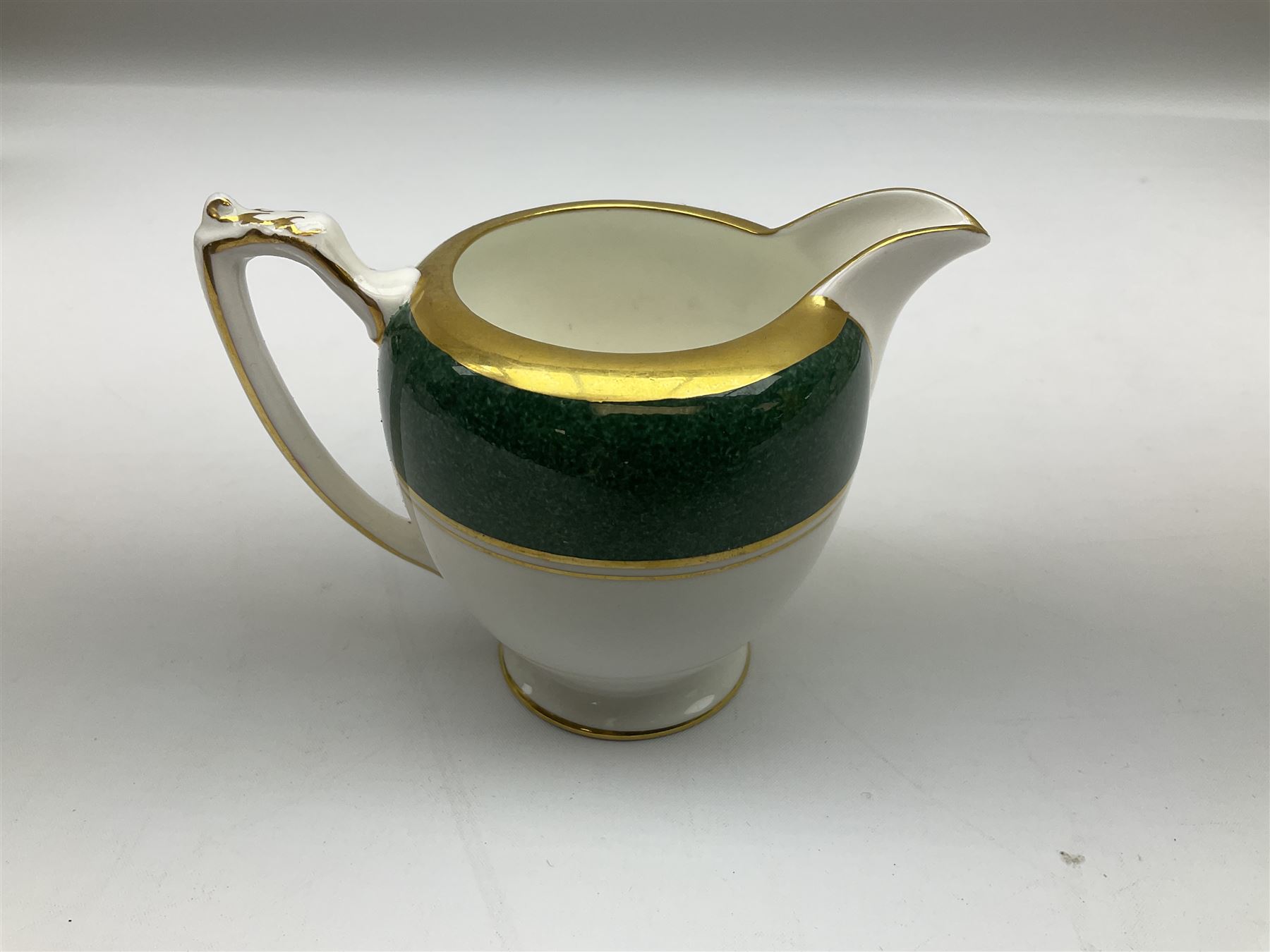 Coalport Athlone Green pattern tea wares, comprising coffee pot, seven coffee cans and saucers, milk jug, open sucrier, six tea cups and saucers, and six twin handled cups and saucers (42) 