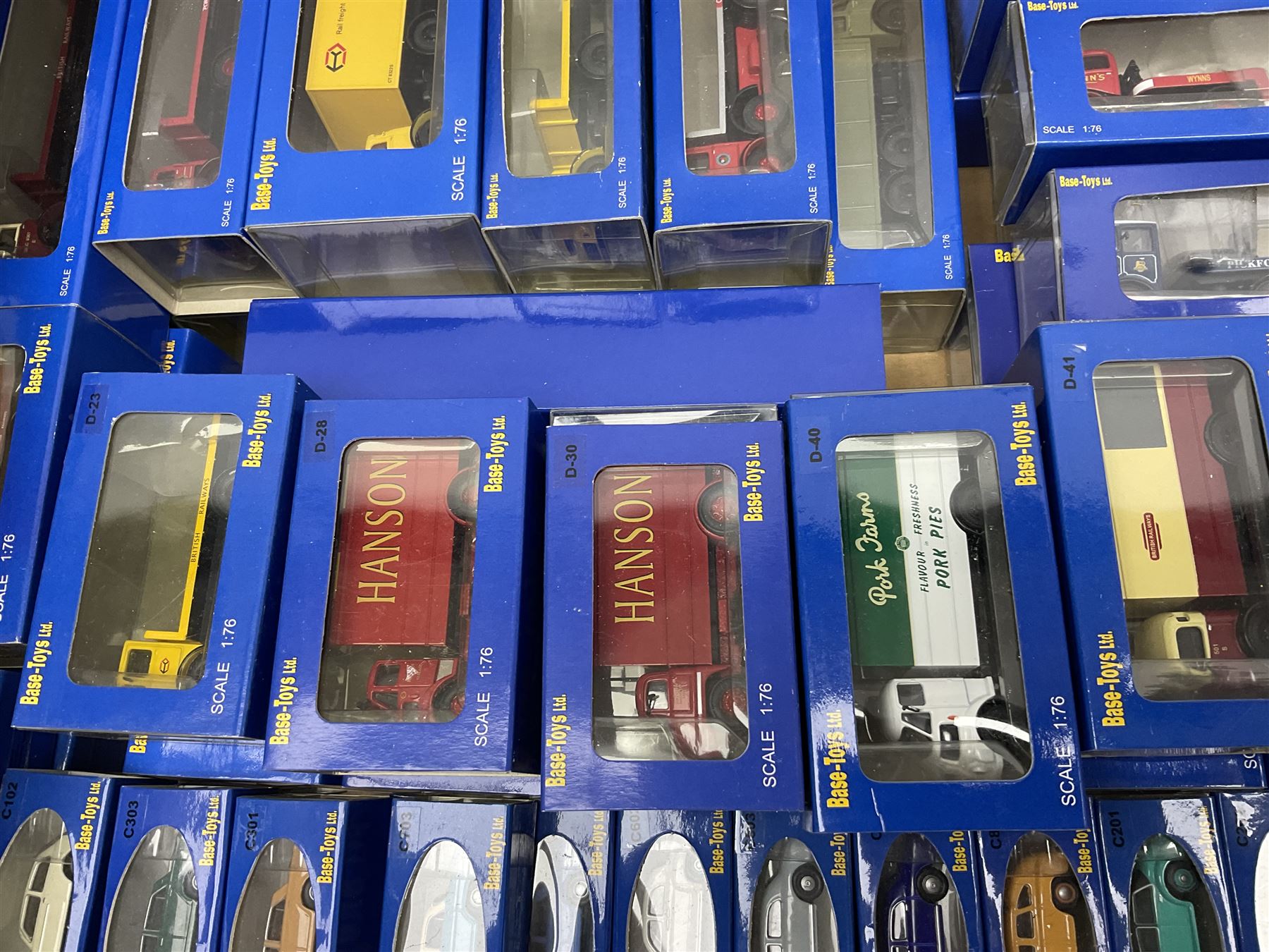 Fifty-seven Base Toys 1:76 scale die-cast models, all boxed (57)