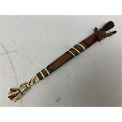 Indian kukri with 29cm curving steel blade and nickel mounted horn grip; in leather covered scabbard with one skinning knife L42cm overall; Hitler Youth knife with scabbard in relic condition; and three African graduated knives each with crudely carved wooden grips and painted leather covered scabbards (5)