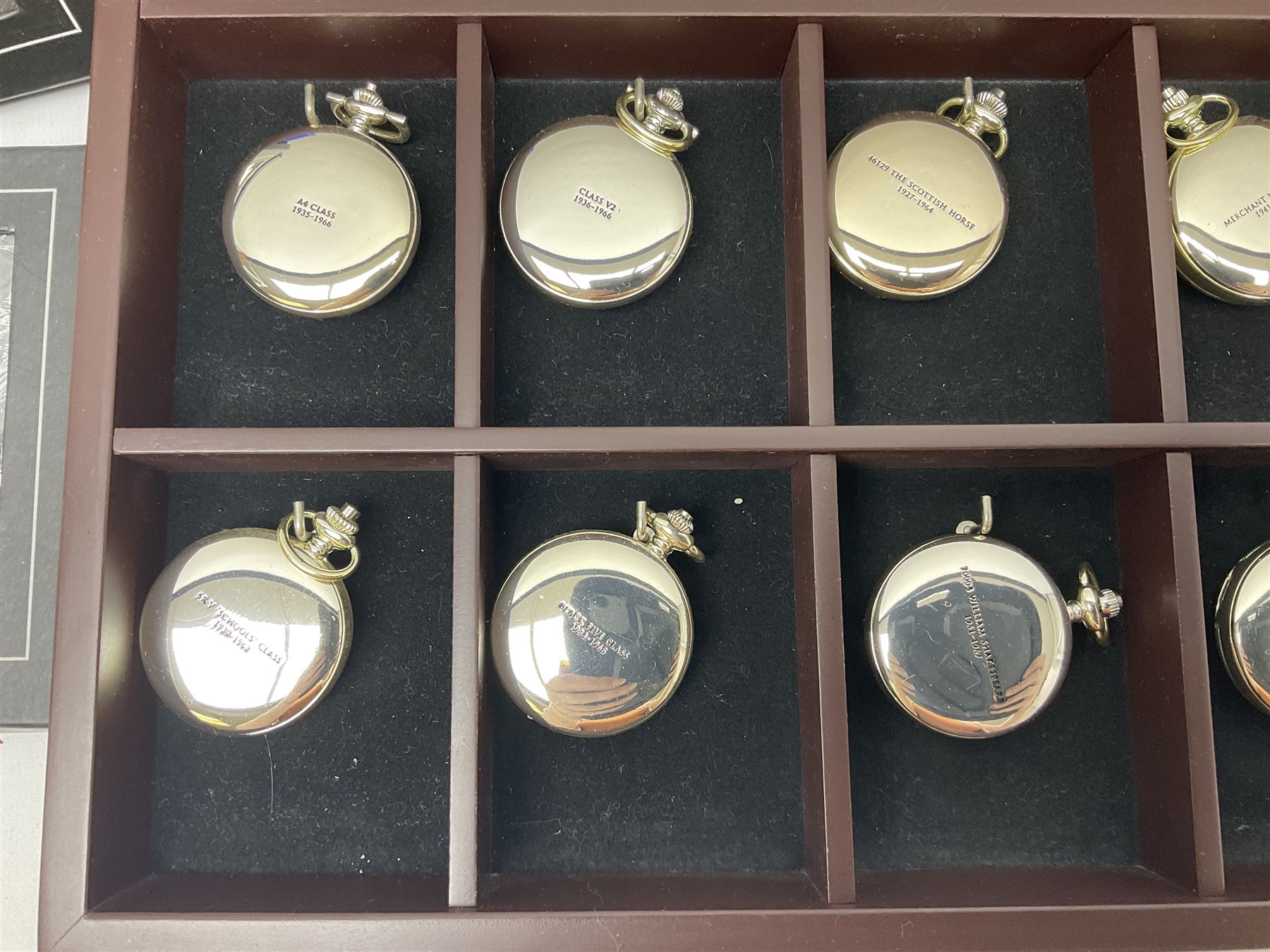 Twenty-three Glory of Steam Atlas Editions silver plated pocket watches, to include The Scottish Horse, Merchant Navy Class, etc, with wood display case, all boxed, twenty one with certificates
