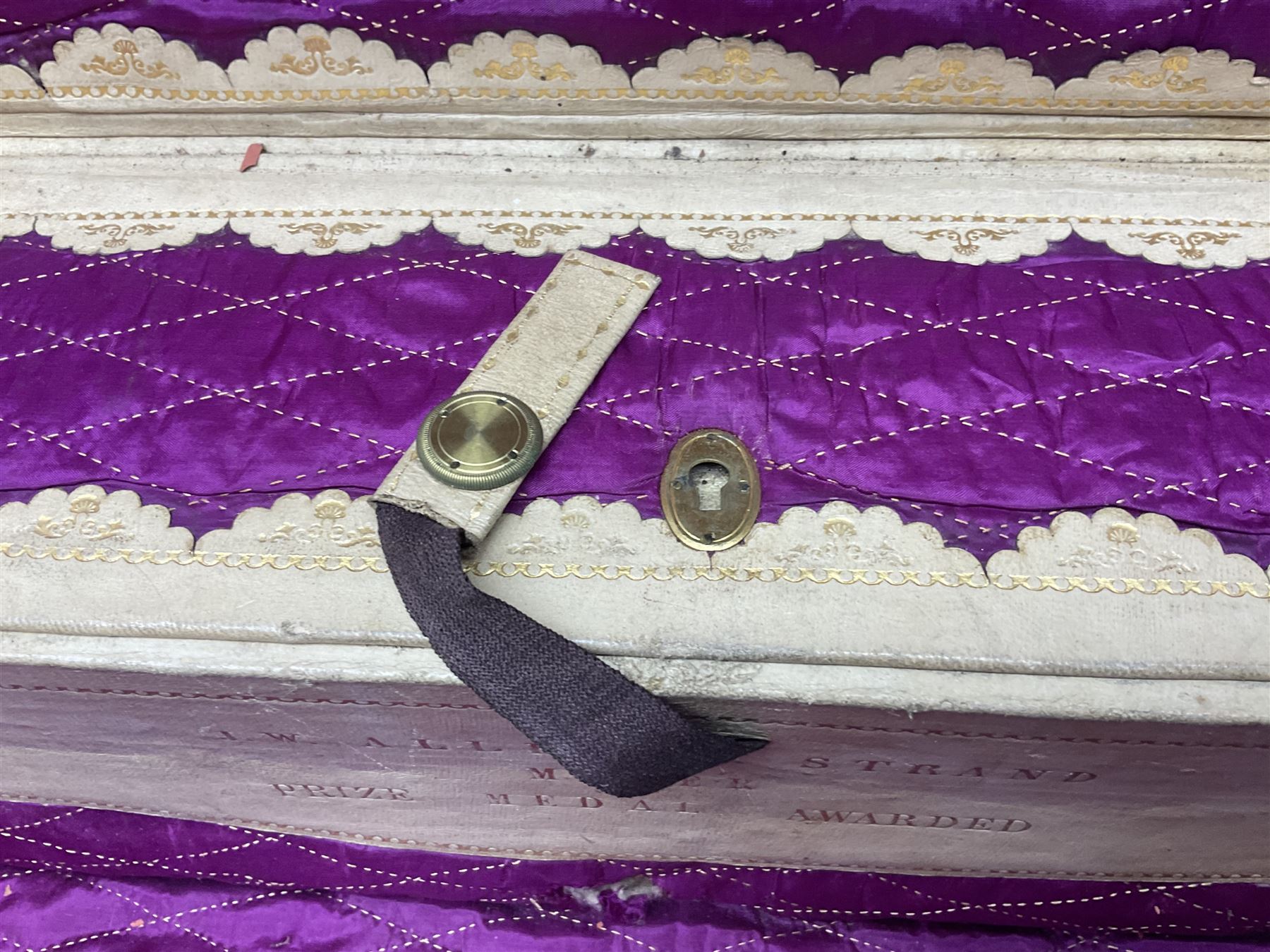 19th century leather suitcase, with brass plaque to cover engraved 'C R F Lutwidge Esq', the pink silk and white kid leather interior with pouch and edging impressed with gilt lettering reading 'By Appointment of Prince of Wales J W Allen 37 Strand Maker Prize Medal Awarded', H21cm, W73cm, Notes: Charles R. Fletcher Lutwidge, was mayor of Tunbridge Wells between 1895-1898, and again between 1901-1902