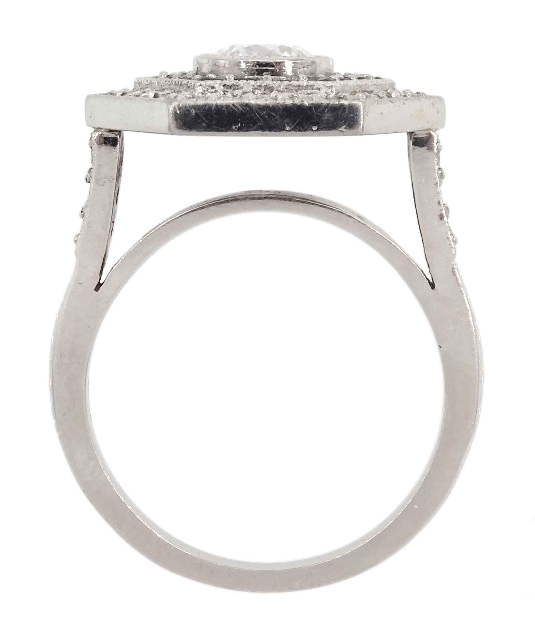 Platinum milgrain set diamond and sapphire hexagonal ring, the principle diamond of approx 0.55 carat, with sapphire and round brilliant cut diamonds, hallmarked