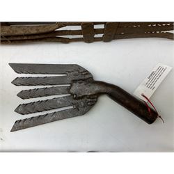 Blue and red painted gas powered bird / pest scarer, bearing label 'Exid bird & pest scarer, imported by C.R.E.A.C.O Hadleigh, Essex', , copper and brass Cymag gas hand pump, three eel spears and a set of badger tongs. Auctioneer's Note: These traps are sold as artefacts for ornamental purposes only as the use of some of them is illegal.