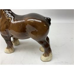 Three Beswick models comprising Hereford Bull no 949, 'CH Cutmil Cupie' Pug, and bay Shire horse, all with printed marks beneath