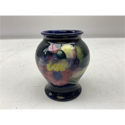 Mid 20th century Moorcroft vase of baluster form decorated in the Orchid pattern on blue ground, shape no. 146, with impressed Moorcroft, Made in England marks beneath, H8cm